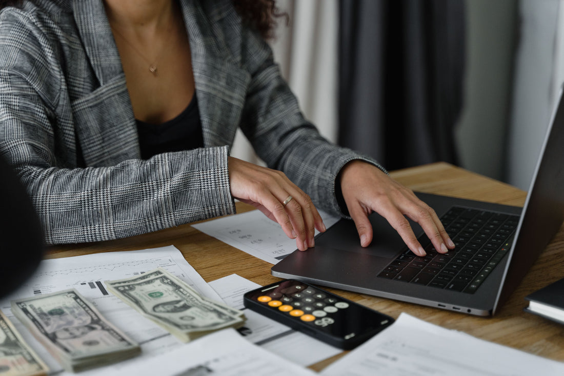 Accountant working on bookkeeping spreadsheets